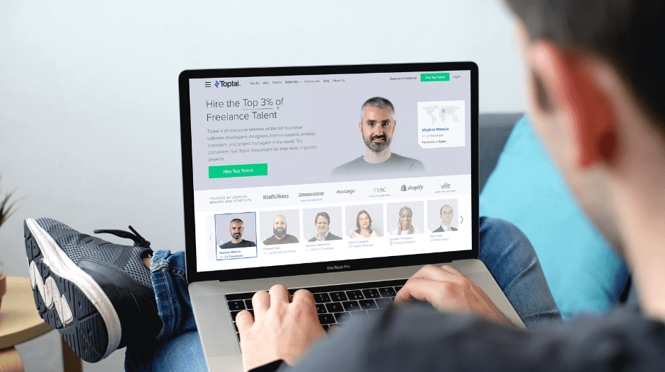 Photo of freelancer browsing Toptal website trying to determine: is joining Toptal worth it